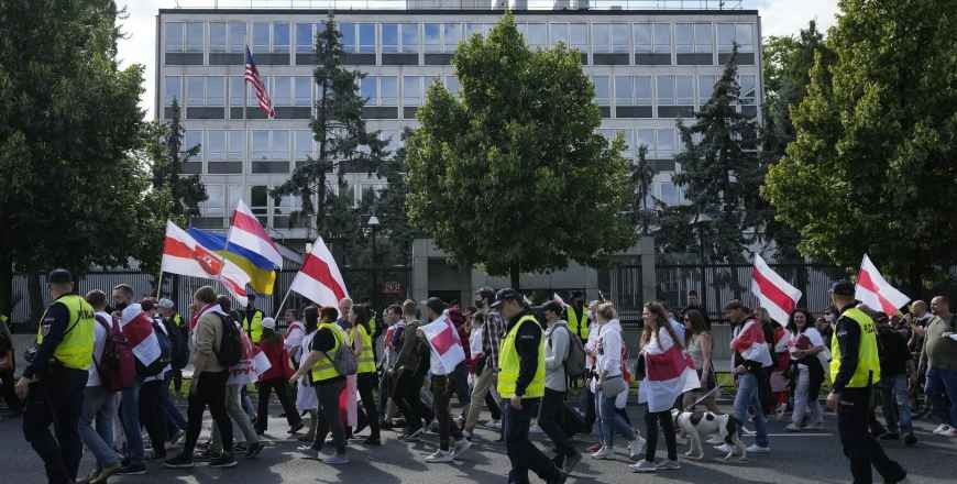 Marches In Warsaw, Kyiv Protest Repression In Belarus On Eve Of Election Anniversary