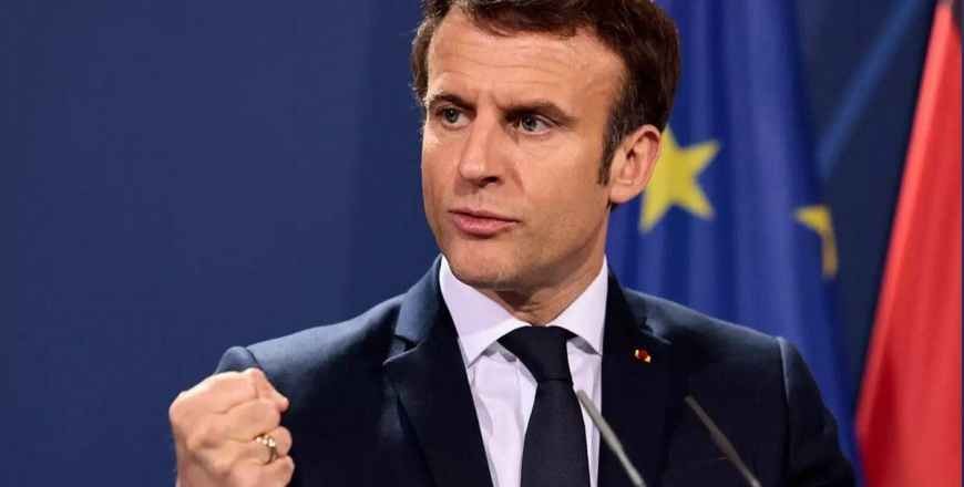 Emmanuel Macron says he believes in a peaceful solution to the conflict in Ukraine